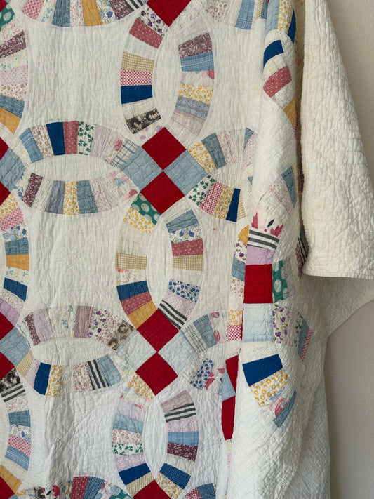 Scrappy Feedsack Wedding Ring Quilt | 1930s